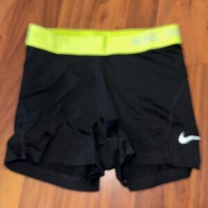 black and neon nike shorts
